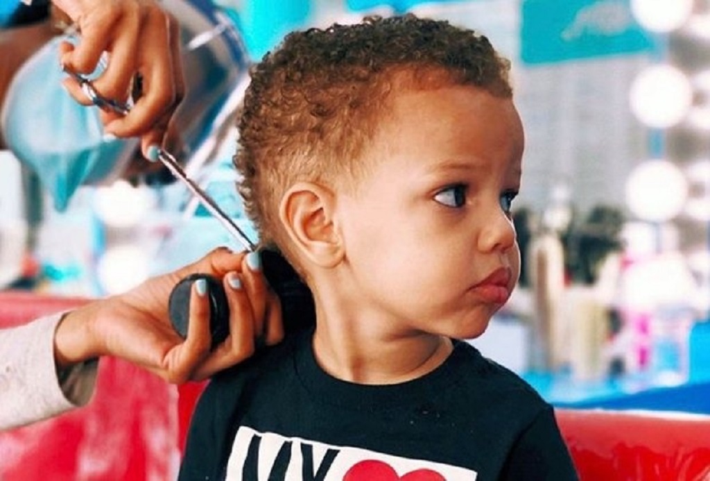 How can I find a kid-friendly barber in Houston