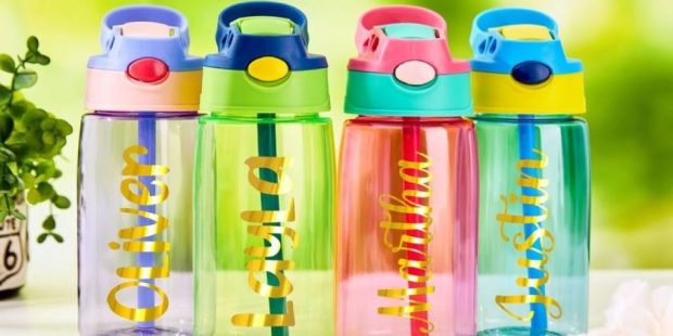 Colorful personalized water bottles with children's names for 8th birthday party favors