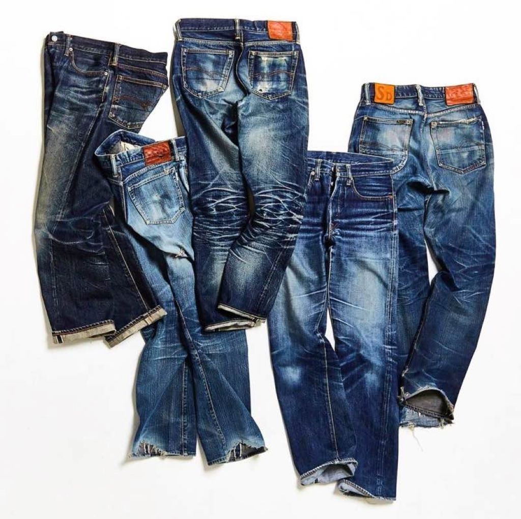 Artisan working on traditional Japanese selvedge denim, highlighting cultural heritage and quality