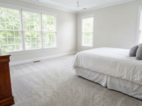 Bedroom odor source inspection inside Charlotte home