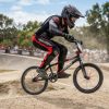 BMX rider wearing protective gear while riding