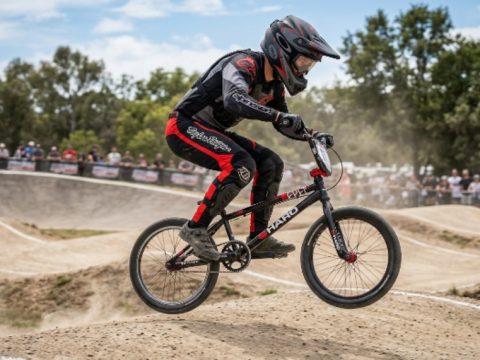 BMX rider wearing protective gear while riding