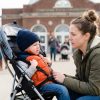Parent calmly helping toddler through emotional meltdown