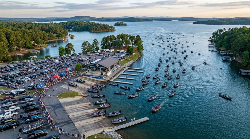 Aerial view of bass fishing boats launching on Lake Hartwell during the 2027 Bassmaster Classic tournament in South Carolina