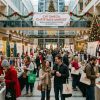Shoppers browsing holiday vendor booths at the Chi Omega Christmas Market inside Dallas World Trade Center in November 2026